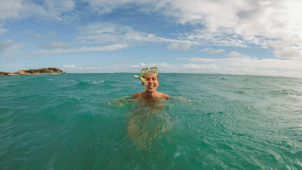 20 Amazing Things to do in Great Keppel Island, Queensland 18 Girl snorkelling in water at Monkey Beach
