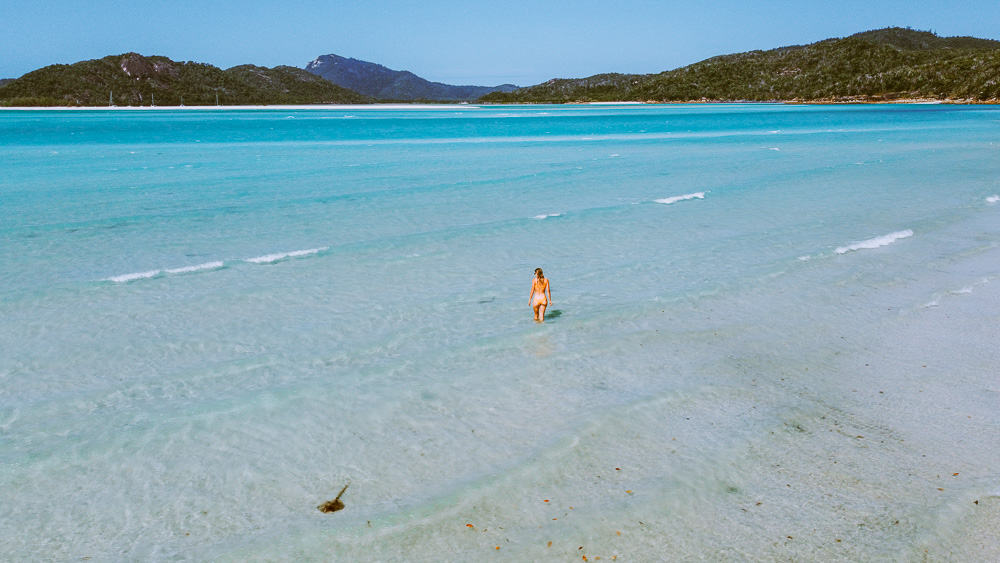 Atlantic Clipper Whitsundays: 3D/2N Sailing Trip Review 14 Sally in water with stingray Whitehaven Bech Whitsundays
