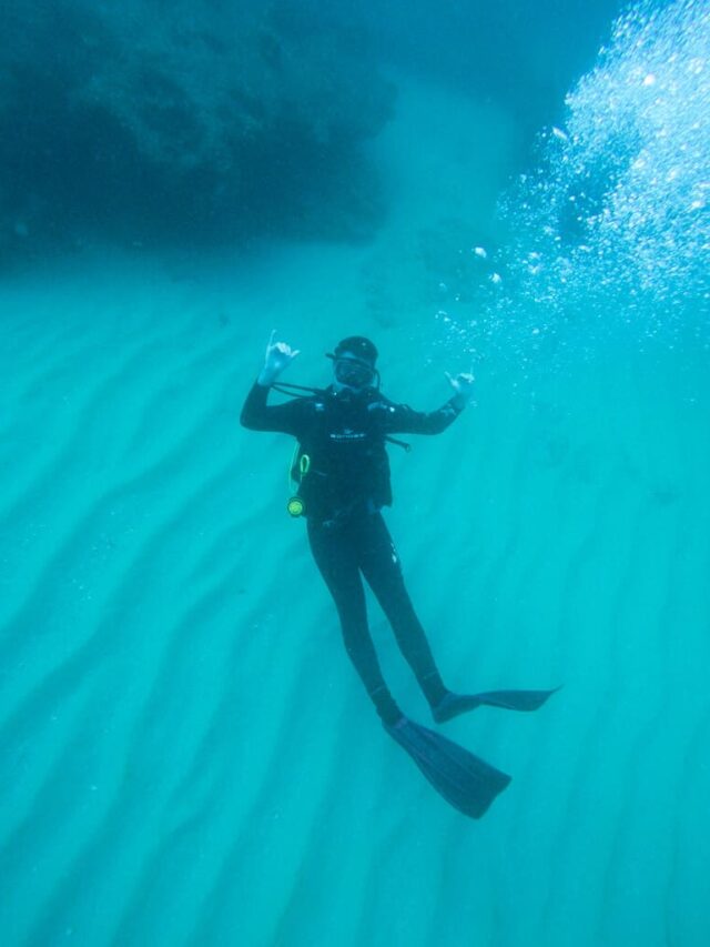 12 Amazing Cabo Day Trips to See More of Baja Sur 25 Brayden gives the shaka sign underwater while exploring the clear, sandy-bottomed ocean off the coast of Cabo San Lucas, Baja California Sur.