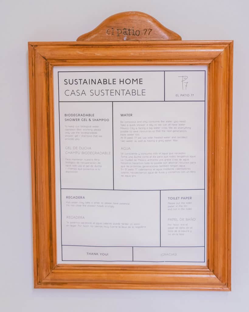 El Patio 77: Sustainable Bed and Breakfast Mexico City 23 A sign at El Patio 77 framed in a wooden frame detailing information about the 'Sustainable Home'