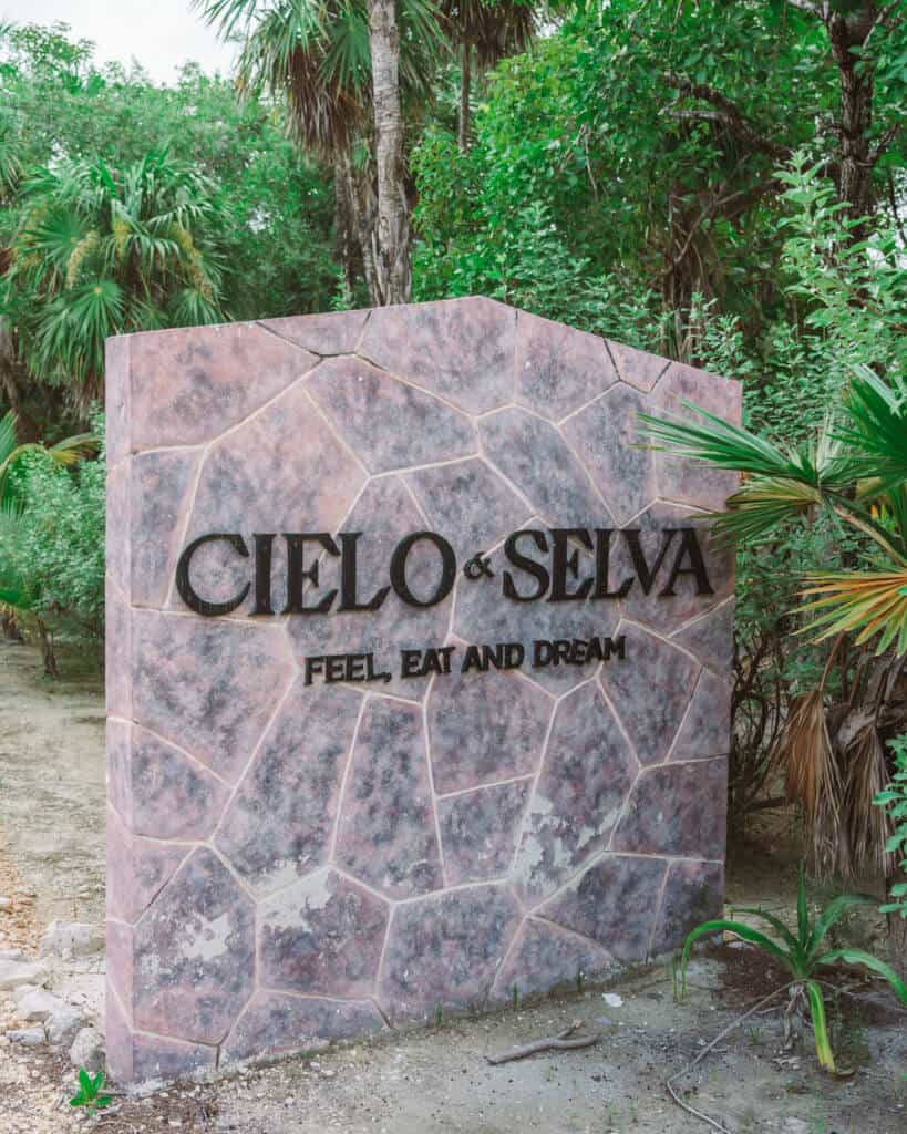 Glamping at Hotel Cielo y Selva in the Sian Ka'an Biosphere Reserve 51 A stone sign saying Cielo & Selva feel, eat and dream