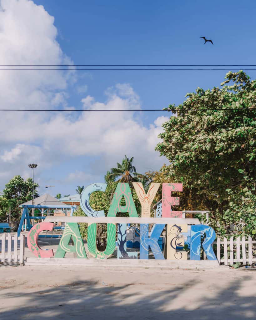 A colourful wooden sign spelling out Caye Caulker