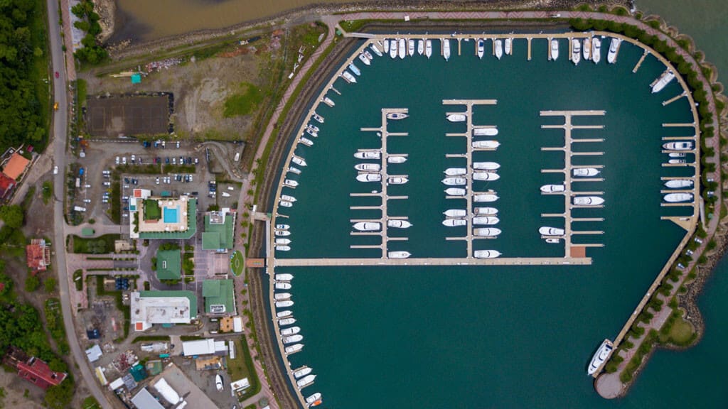 An aerial shot of boats parked in the Pez Vela Marina in Quepos