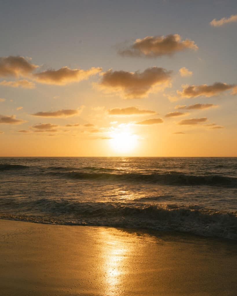 San Pancho Mexico Travel Guide: Tropical Bliss in Nayarit 16 A bright golden sun setting over the beach in San Pancho