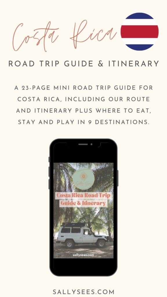 A Canva graphic advertising my Costa Rica road trip guide freebie, with a graphic of an iPhone with the cover of the guide on the screen, with a photo of a white 4WD car amongst palm trees and the Sally Sees logo