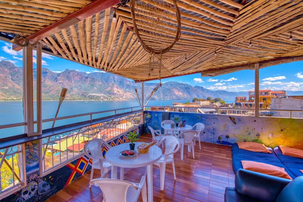 Lake Atitlan Travel Guide: Everything You Need to Know 16 Rooftop lounge area with bamboo ceiling and sweeping lake views at Hotel Amigos in San Pedro La Laguna, Lake Atitlán, Guatemala.