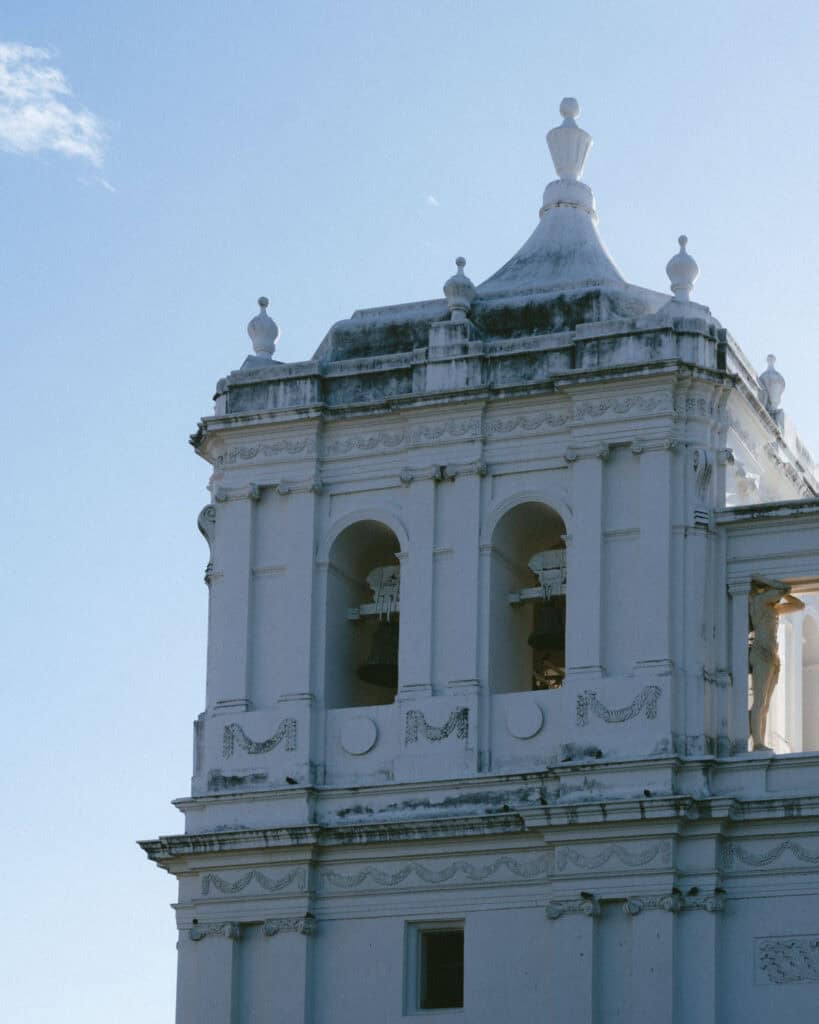 18 Best Things to Do in Leon, Nicaragua 11 A closer view of one of León Cathedral’s bell towers, showcasing its intricate architectural details and large bells.