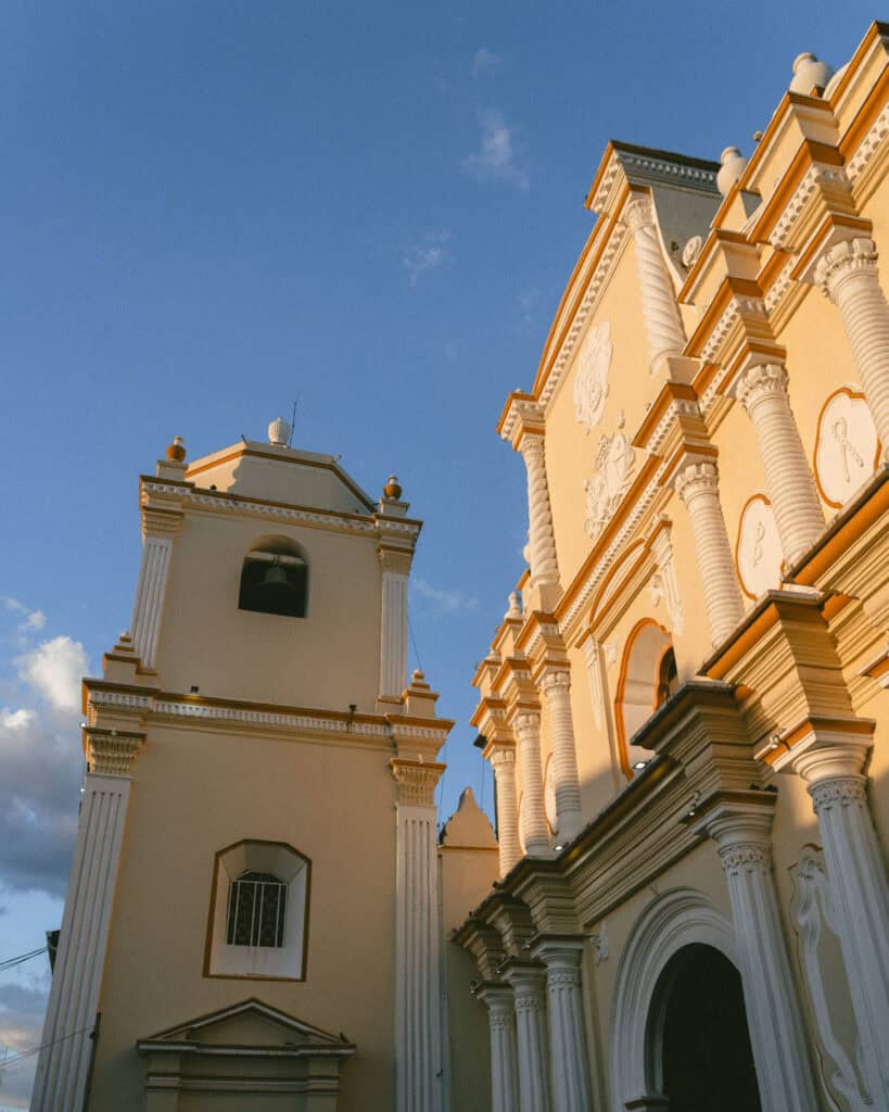 Hiking Telica Volcano in Nicaragua: A Magical Sunrise 19 A view of Iglesia de La Merced in León, Nicaragua, showcasing its detailed facade bathed in the golden light of sunset.