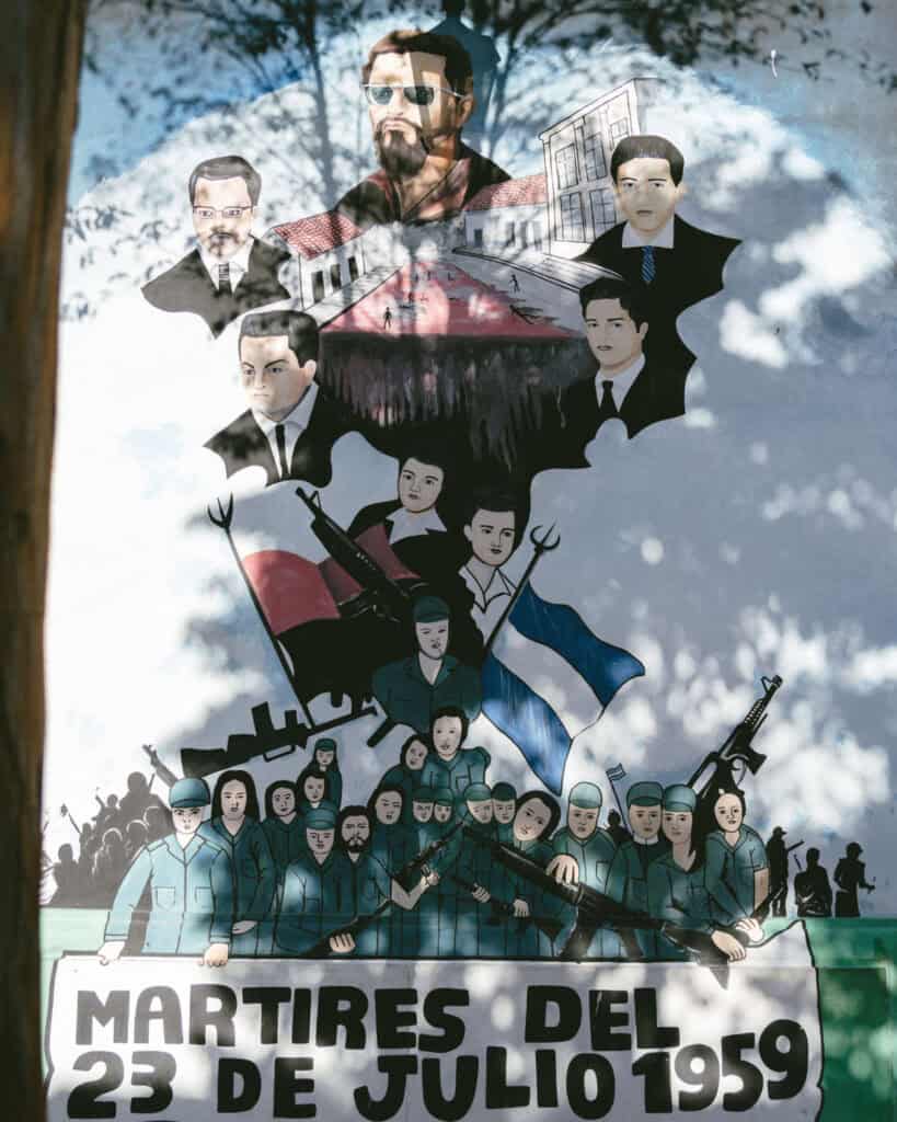 18 Best Things to Do in Leon, Nicaragua 22 A memorial mural for the "Mártires del 23 de Julio 1959" in León, Nicaragua, honoring fallen heroes with depictions of their faces and historical events.