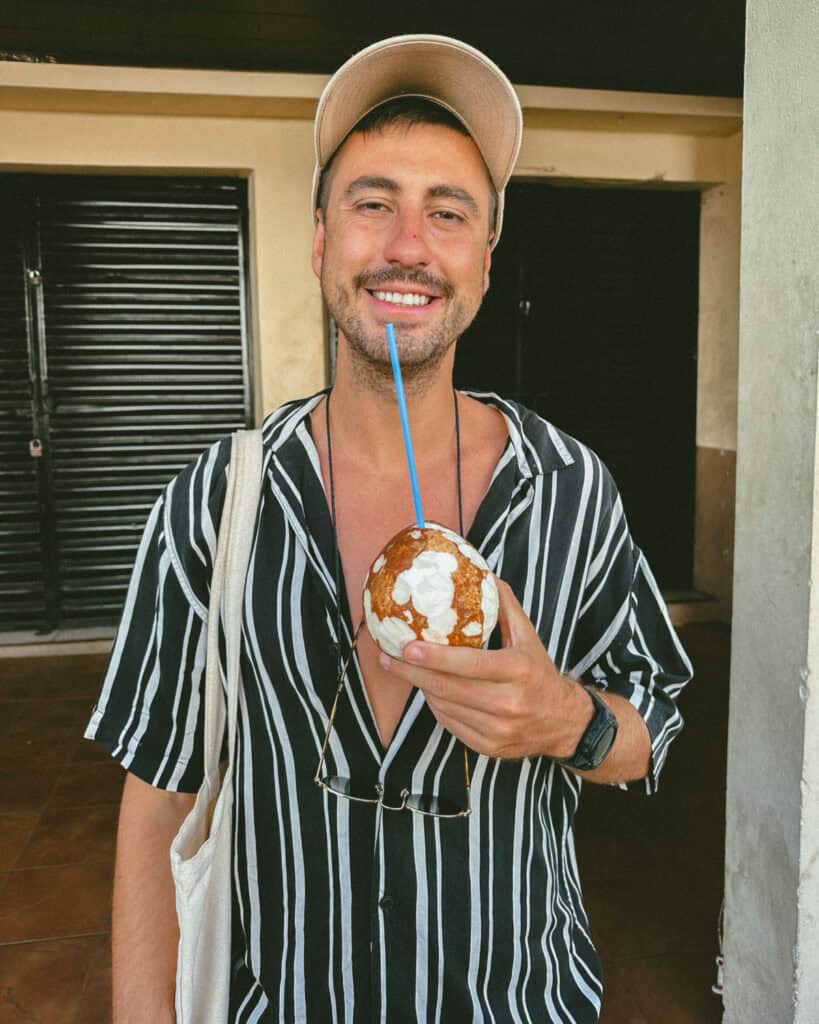 18 Best Things to Do in Leon, Nicaragua 25 Brayden enjoying a fresh coconut drink at Mercado Central in León, Nicaragua.
