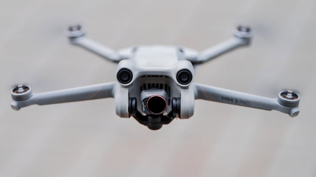No Drones in Nicaragua: Our Solution 1 A photo of a DJI Mini 3 Pro drone hovering in the air.