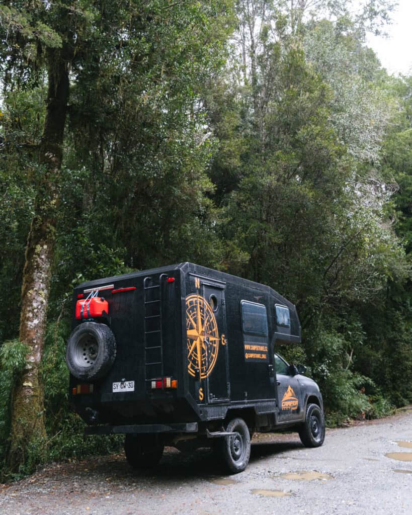 Hornopiren, Chile Travel Guide: Termas, Alerces & Fjords 8 Our 4x4 camper from Camper Travel Chile parked at the entrance to the Chaicas Sector of Alerce Andino National Park.