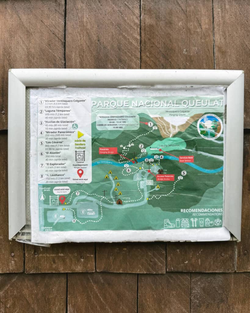 Queulat National Park: How to Visit the Ventisquero Colgante 2 A photo of a sign of Parque Nacional Queulat, with trails, parking and attractions shown on the map and a list of the hiking trails and details.