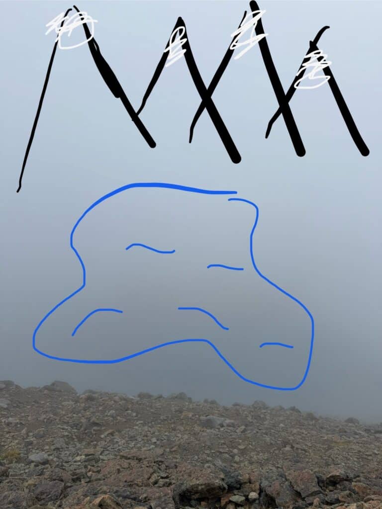 Laguna Cerro Castillo, Chile Hiking Guide 21 A photo of what should be a mirador of Laguna Cerro Castillo but it is covered in cloud. Sally drew over the top on her phone to show where the lagoon and mountains should be.