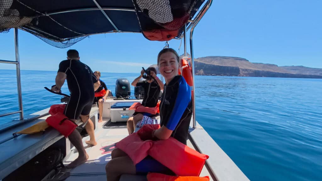 Our Day at Isla Espiritu Santo, La Paz: Sea Lions & Beaches 24 Sally on a boat at Isla Espiritu Santo wearing a wet suit and ready to go snorkelling with sea lions.